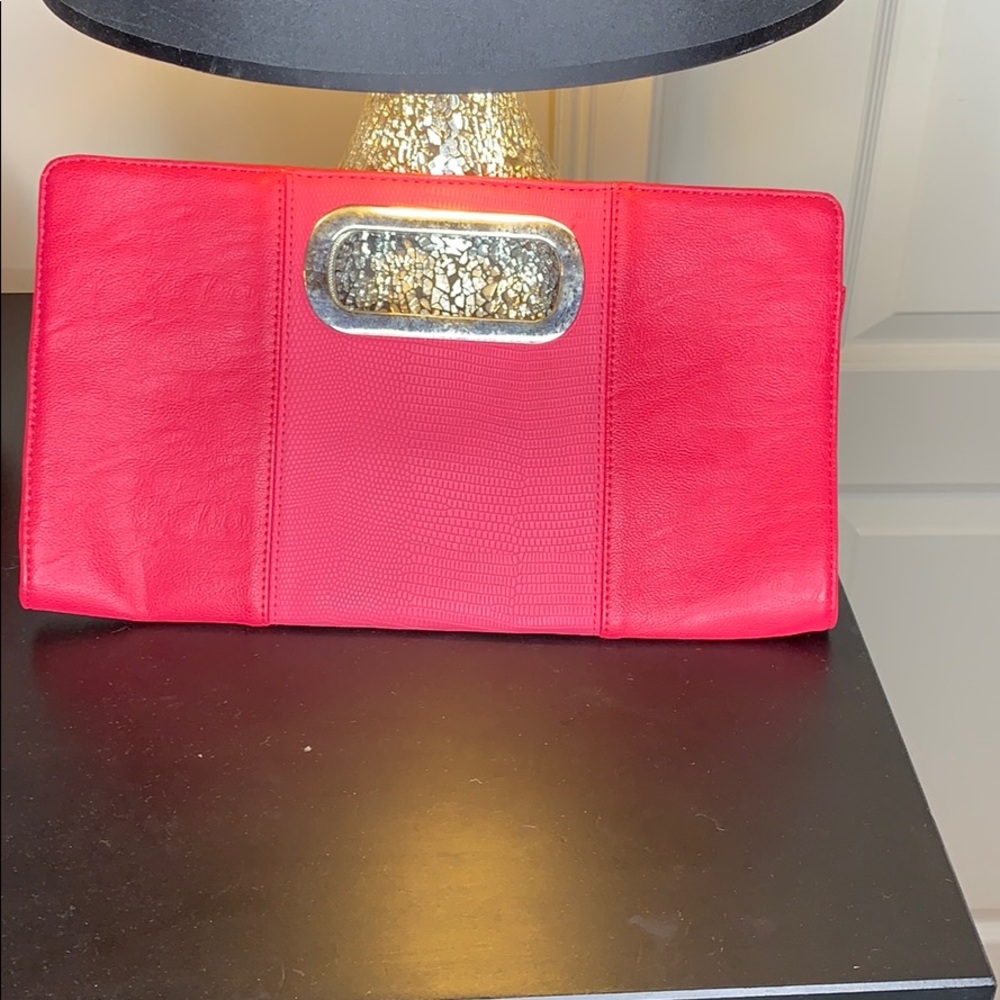 Hot pink clutch.
